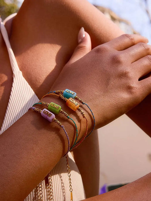 Bracelet Tressé LOVE (plusieurs coloris) par FLÂNERIE • NEW, SUMMER, Summertime