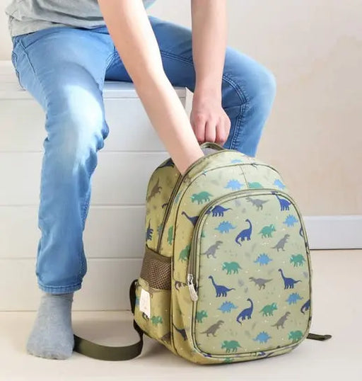 Sac à dos dinosaures (avec compartiment isotherme) par A LITTLE LOVELY COMPANY • BACK TO SCHOOL, 